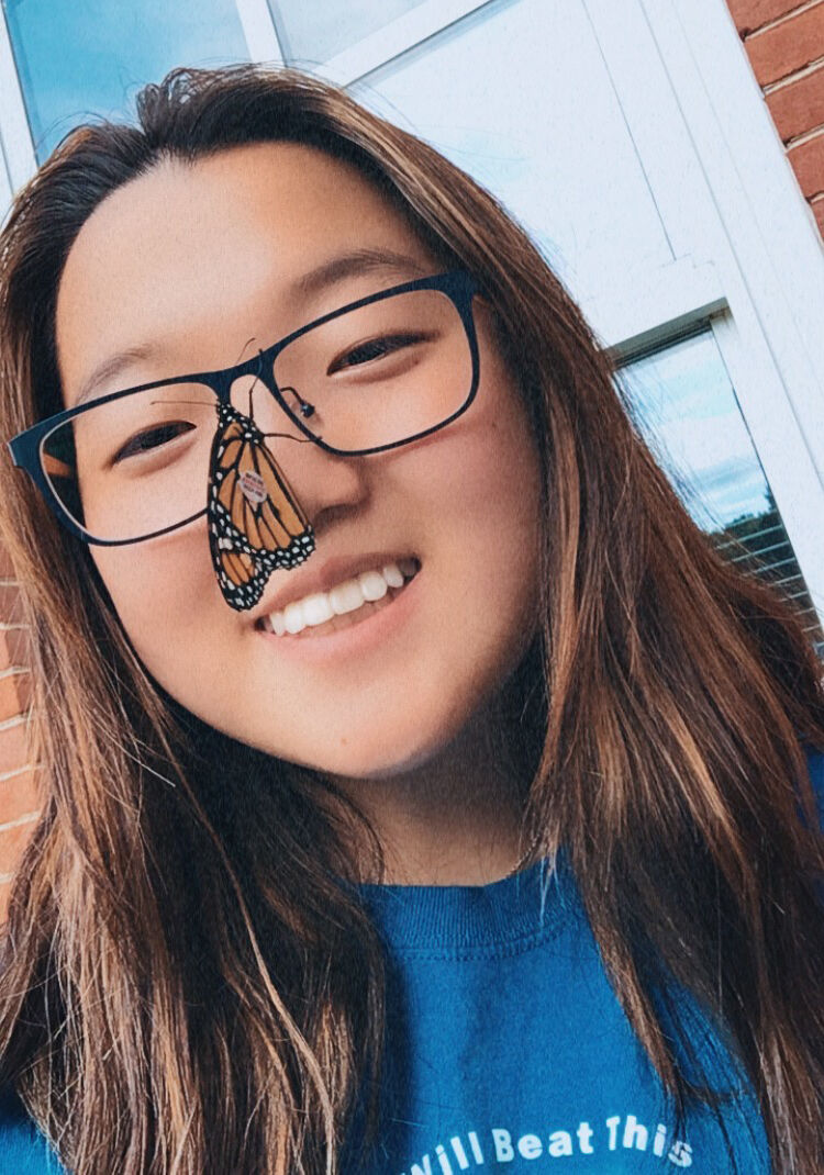 Butterfly on woman's face
